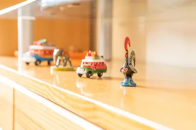 a group of toy figurines sitting on top of a counter at Apartamento Ultreia in Palas de Rei