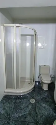 a bathroom with a shower and a toilet at El piso de Manuela VUT-CO-004057 in Padrón