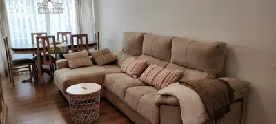 a living room with a couch and a table at CARMELA in Santiago de Compostela