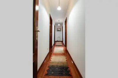 an empty hallway with a rug on the floor at APARTAMENTO EN A ESTRADA/GALICIA in A Estrada