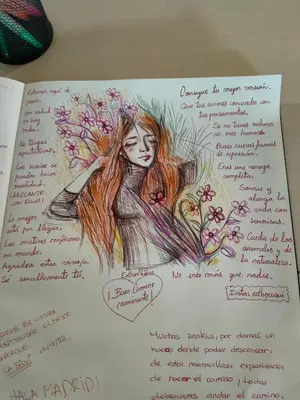 a drawing of a woman with red hair and flowers at Los Tres Abetos in Arzúa