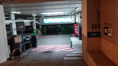 a parking garage with a large television in it at LUXURY DescansoTERMAL in Ourense