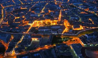 an aerial view of a city at night at Gran Vía in Lugo