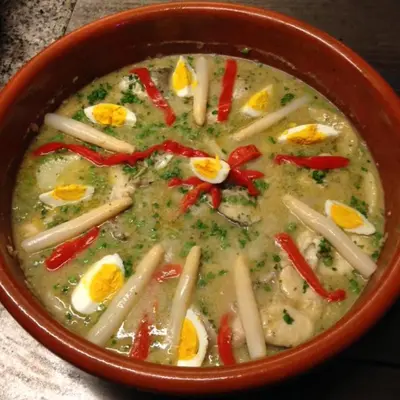 a bowl of soup with noodles and eggs and peppers at Casa San Ginés in Cruces