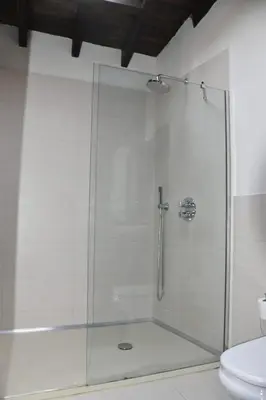 a shower with a glass door in a bathroom at Ribeira sacra ourense in Ourense