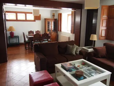 a living room with a couch and a table at Casa Camino Santiago-Fisterra in Amés
