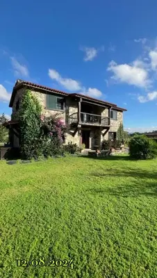 a large house with a large yard in front of it at Camiño da Vieira in Padrón