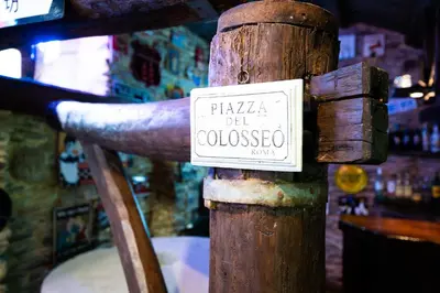 a sign that says piazza del lobo on a wooden pole at Villa en Asturias con cine, Piscina, BBQ, Juegos, 14 Pax in Cobre