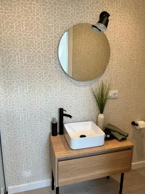 a bathroom with a sink and a mirror at CONCHEIROS 5 APARTAMENTOS TURISTICOS in Santiago de Compostela