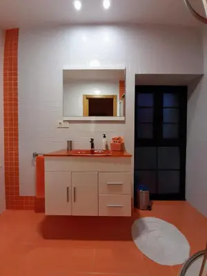 a bathroom with a sink and a mirror at Casa Galipendre in A Estrada