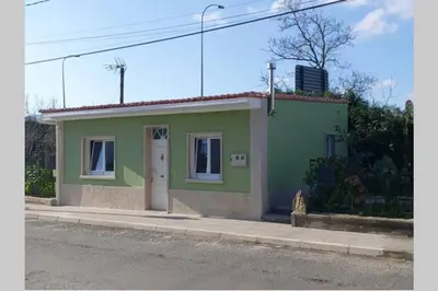 a small house on the side of a road at Casa IRIENSE VUT-CO-004308 in Padrón
