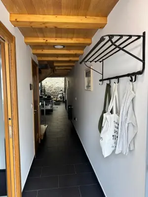 a hallway of a house with a wooden ceiling at Casa Alameda 23 de Casas Das Figueiras en Ría Eo-Ribadeo in Castropol