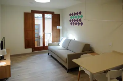 a bathroom with a sink and a mirror at APARTAMENTOS TURÍSTICOS GUIANA in Ponferrada