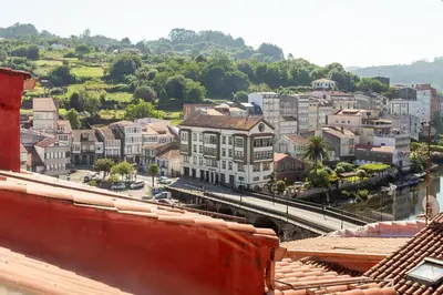 a view of a city with a train station at Apartamentos Moreira & Betanzos in Betanzos