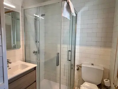 a bathroom with a shower and a toilet and a sink at CASA MENCIA in Sober