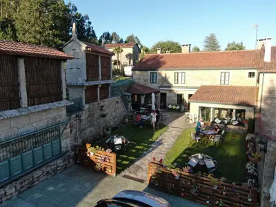 an aerial view of a house with a road at Casa de Costoia in Santiago de Compostela