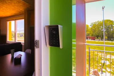 a room with a door with a view of a window at CELTAINER in Maceda