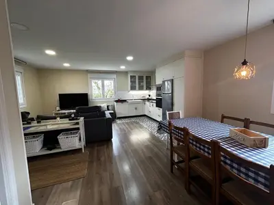 a living room with a couch and a table at Casa Otilia - Rural - Camino de Santiago - Arzúa in Arzúa