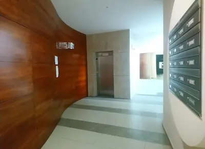a hallway of a building with a wooden wall at Os limoeiros do cura in Foz