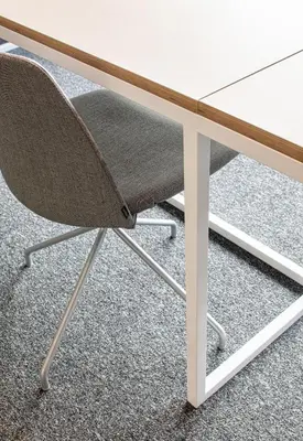 a white table with a chair underneath it at Hotel Forum Ceao in Lugo