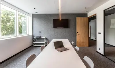 a conference room with a white table and chairs at Hotel Forum Ceao in Lugo