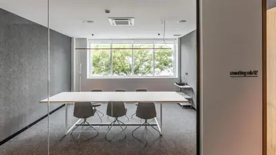 a conference room with a white table and chairs at Hotel Forum Ceao in Lugo