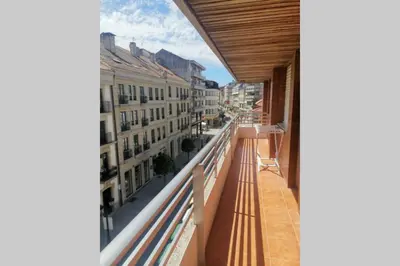 a balcony with a view of a city at Apartamento Lalín Centro ll in Lalín