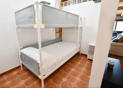a bunk bed in a room with at Casa da Ponte in Monforte de Lemos