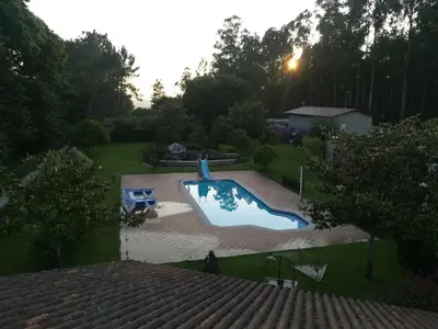 an overhead view of a swimming pool in a yard at Villageermis - Casa Rural in Moraña