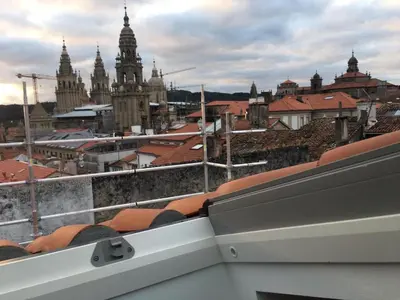 a view of a city from the roof of a building at Atico en el casco histórico in Santiago de Compostela