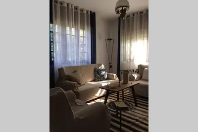 a living room with a couch and a table at Casa Rural Picape in Pedre