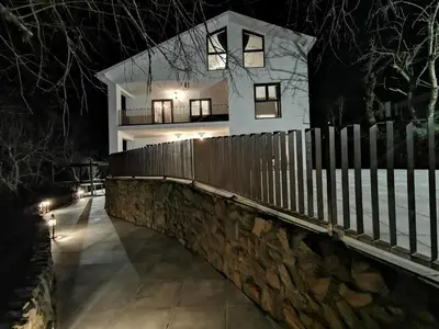 a house on a bridge with a fence at VILLA MAREL in Trefacio