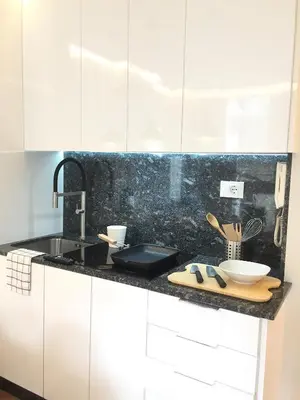 a kitchen with a sink and a counter top at Nordico in Ourense