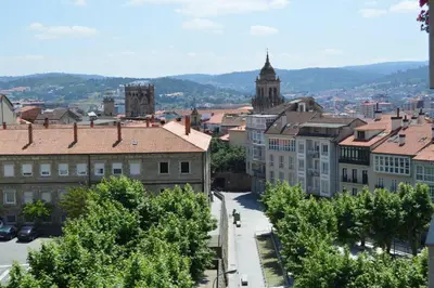 a view of a city with buildings and trees at Amplio y luminoso piso en el centro de Ourense in Ourense