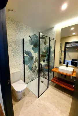 a bathroom with a toilet and a shower and a sink at Solarena Bistrot in Barreiros