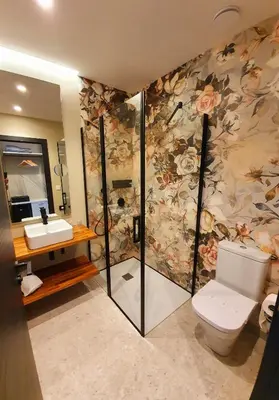 a bathroom with a toilet and a sink at Solarena Bistrot in Barreiros