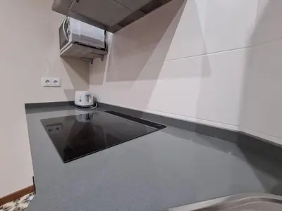 a kitchen with a sink and a counter top at Casa da Marquesa Sarria in Sarria
