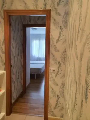 a mirror in the hallway of a room at Noja rooms 1 in O Pedrouzo