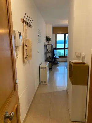 a hallway with a door to a room at Luky Miño in Miño