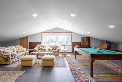 a living room with a pool table and couches at LE LLAR casa con 2 PISCINAS 1 CLIMATIZADA INTERIOR muy cerca de Santiago de Compostela in Amés