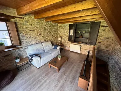 an overhead view of a living room with a couch at Casa rural LA TORRE recién rehabilitada. in Las Herrerías