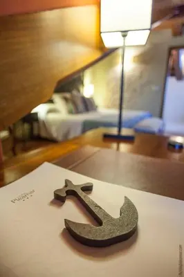 a knife sitting on top of a table in a room at Hotel Pleamar in Puerto de Vega