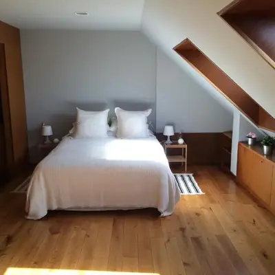 Attic loft to wake up by the sea.