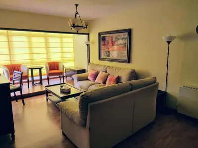 a living room with a couch and a table at ACT RIOCOBO in Cervo