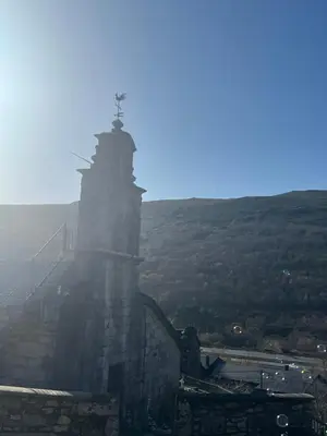 a view of a building with a clock tower at Villa Adilia in Padornelo