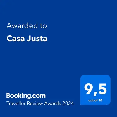 a screenshot of a cell phone with the text awarded to casa jussica at Casa Justa in Castrelo de Miño