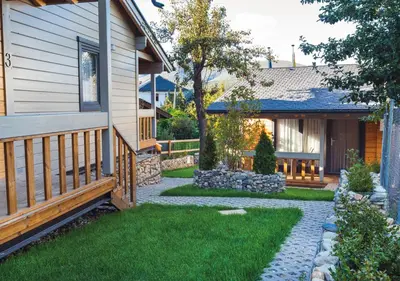 a house with a walkway next to a house at Estudios Galende in Galende