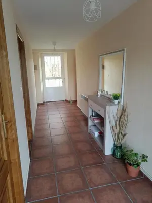 a hallway with a bathroom with a sink and a mirror at CASA ISAURA DE PENA Camino Primitivo in Pacio