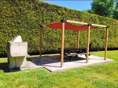 a garden with a fence and some bushes at Finca O Loureiro in Amés