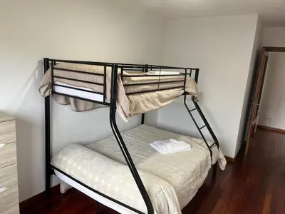 a bunk bed in a room with at Apartamento Bralo in Padrón
